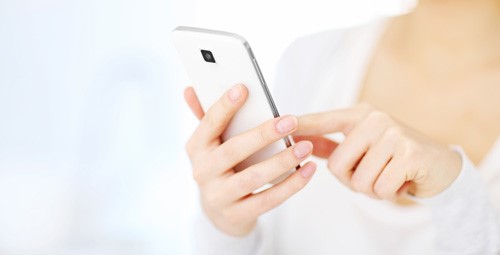 A woman using a mobile phone